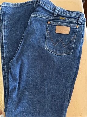 Wrangler Indigo Blue Denim Jeans with Leather Patch